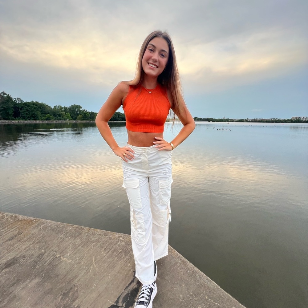 Orange Crop Top and White Cargo Pants